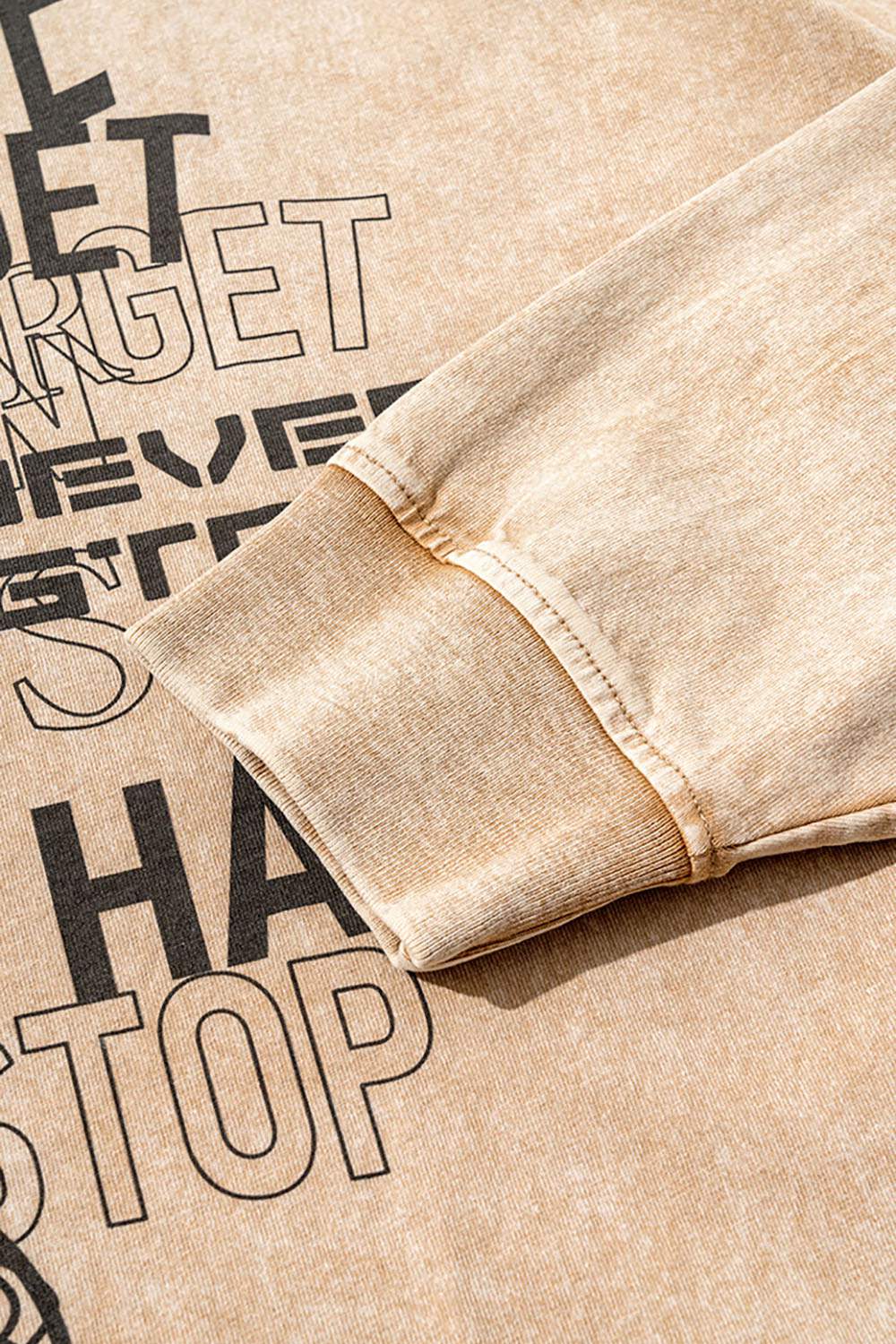 Moisture-Wicking Washed Graphic Cotton Long-Sleeve T-Shirt in Khaki - cuff detail
