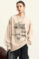 Moisture-Wicking Washed Graphic Cotton Long-Sleeve T-Shirt in Khaki - front modeled view
