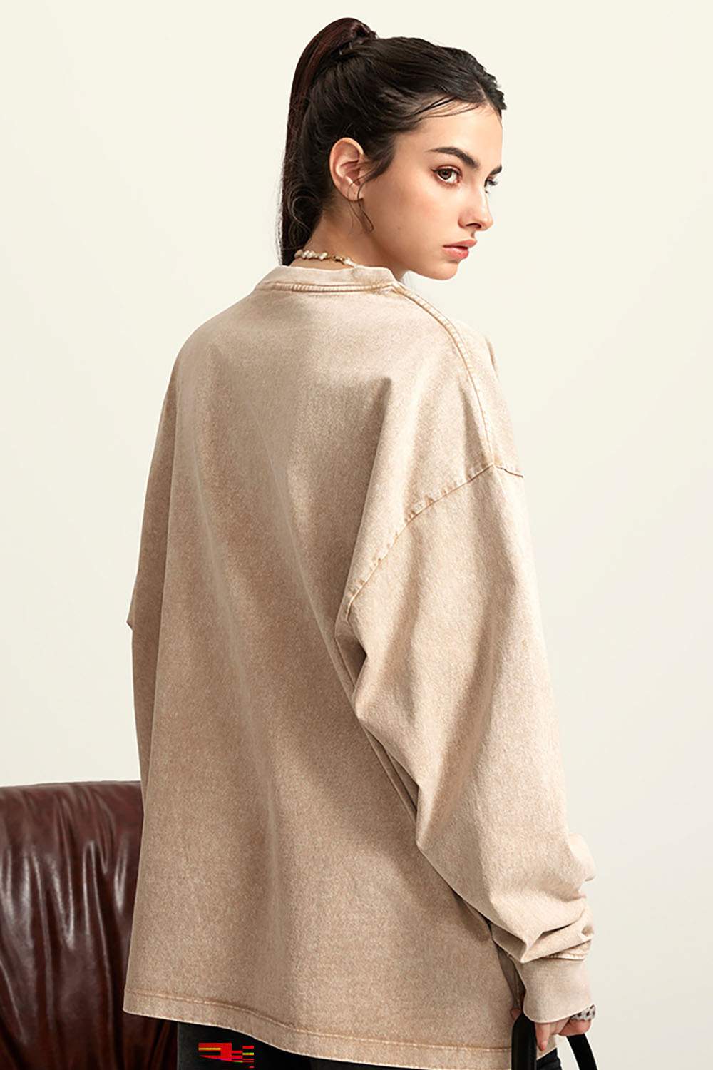 Moisture-Wicking Washed Graphic Cotton Long-Sleeve T-Shirt in Khaki - rear three-quarter modeled view