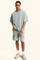Heavyweight Distressed-Wash Cotton T-Shirt in Light Gray - full-length front modeled view