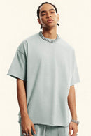 Heavyweight Distressed-Wash Cotton T-Shirt in Light Gray - front modeled view