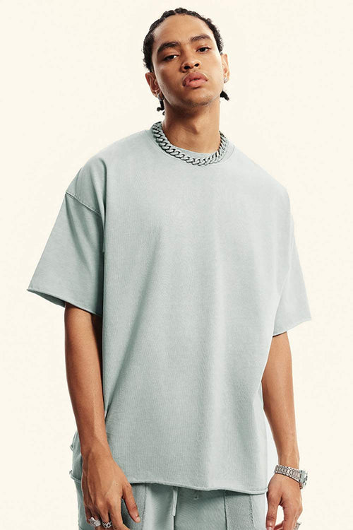 Heavyweight Distressed-Wash Cotton T-Shirt in Light Gray - front modeled view