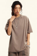 Heavyweight Distressed-Wash Cotton T-Shirt in Mud - front modeled view