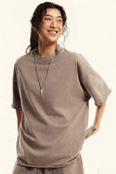 Heavyweight Distressed-Wash Cotton T-Shirt in Mud - front modeled view
