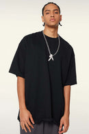 Vintage-Wash Heavyweight Cotton Oversized Crew-Neck T-Shirt in Black - front modeled view