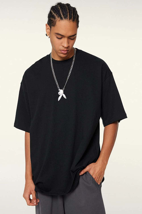 Vintage-Wash Heavyweight Cotton Oversized Crew-Neck T-Shirt in Black - front modeled view