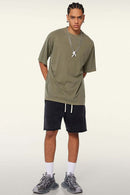 Vintage-Wash Heavyweight Cotton Oversized Crew-Neck T-Shirt in Camel - full-length front modeled view