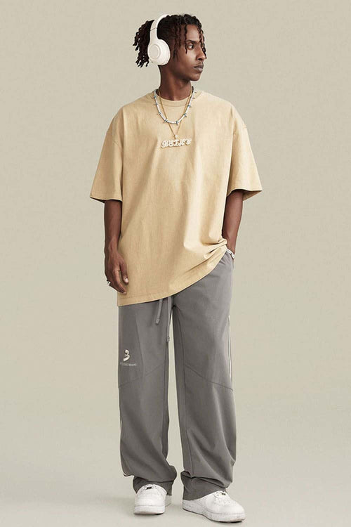 Vintage-Wash Heavyweight Cotton Oversized Crew-Neck T-Shirt in Khaki - full-length front modeled view