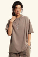 Washed Raw-Edge Heavyweight Cotton T-Shirt in Mud - three-quarter front modeled view