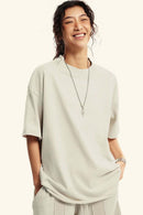Washed Raw-Edge Heavyweight Cotton T-Shirt in Slate Rice - front modeled close-up