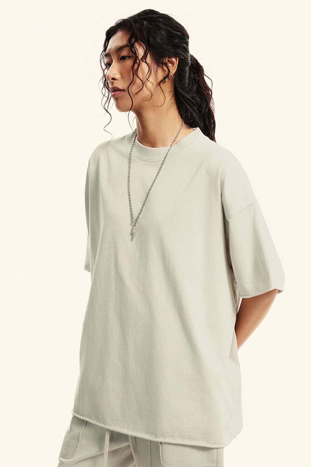 Washed Raw-Edge Heavyweight Cotton T-Shirt in Slate Rice - three-quarter front modeled view