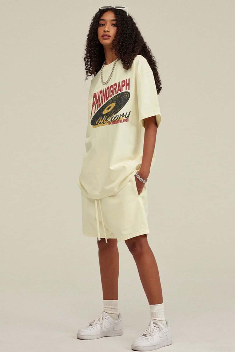 Washed Gramophone-Graphic Cotton T-Shirt in Milk Tea White - front modeled view