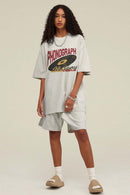Washed Gramophone-Graphic Cotton T-Shirt in Oat Gray - front modeled view