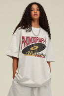 Washed Gramophone-Graphic Cotton T-Shirt in Oat Gray - front modeled view