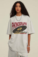 Washed Gramophone-Graphic Cotton T-Shirt in Oat Gray - front modeled view