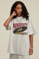 Washed Gramophone-Graphic Cotton T-Shirt in Oat Gray - front modeled view