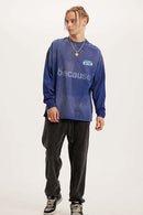 Washed Typographic Graphic Cotton Long-Sleeve T-Shirt in Blue - full-length front modeled view