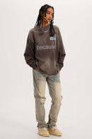 Washed Typographic Graphic Cotton Long-Sleeve T-Shirt in Coffee - full-length front modeled view