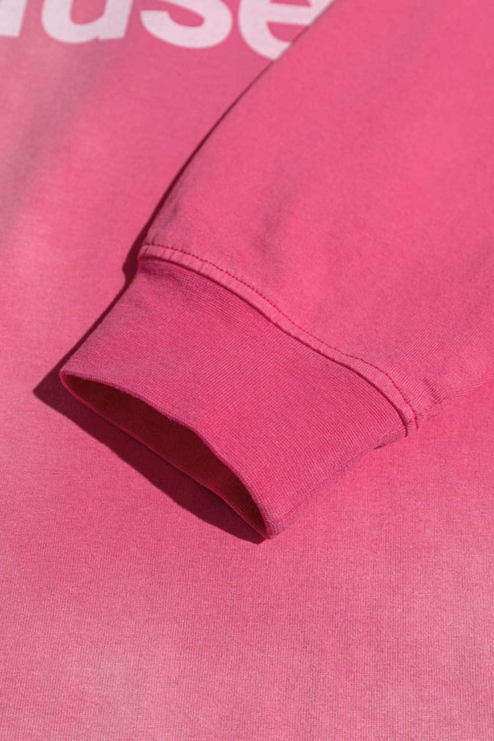 Washed Typographic Graphic Cotton Long-Sleeve T-Shirt in Rose Red - cuff detail