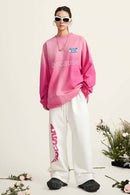 Washed Typographic Graphic Cotton Long-Sleeve T-Shirt in Rose Red - full-length front modeled view