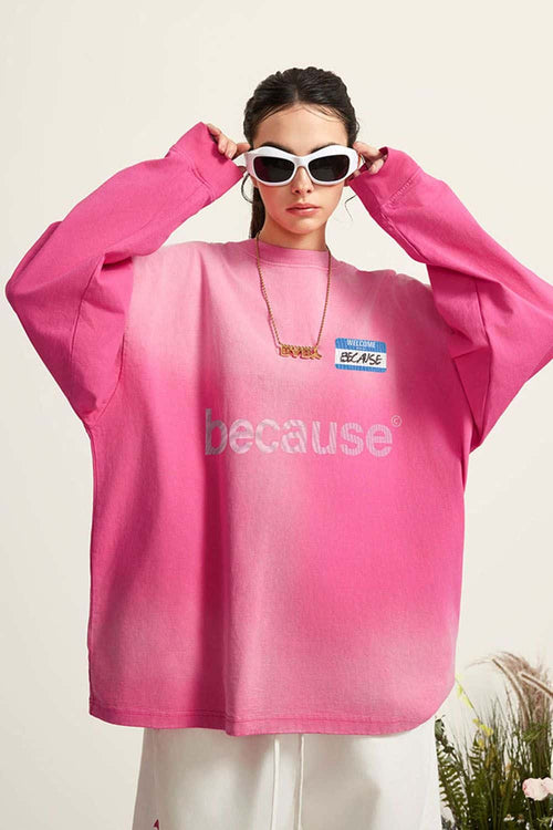 Washed Typographic Graphic Cotton Long-Sleeve T-Shirt in Rose Red - front modeled close-up