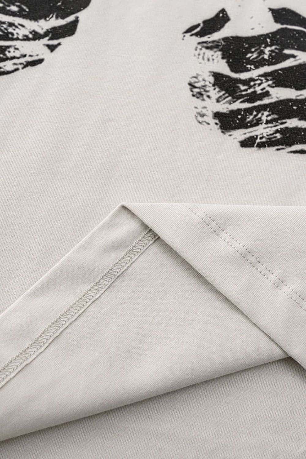 Crossed-Scissors Graphic Long-Sleeve Tee in Sandy Apricot - hem detail