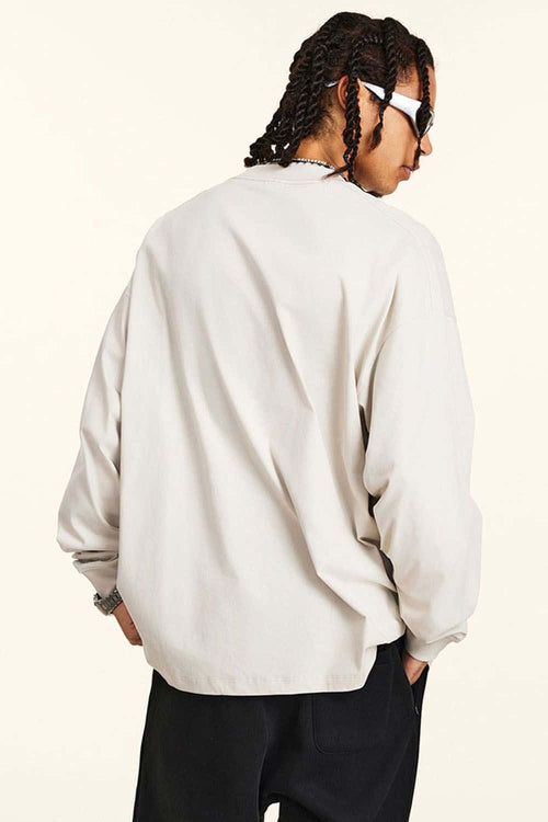 Crossed-Scissors Graphic Long-Sleeve Tee in Sandy Apricot - product detail close-up