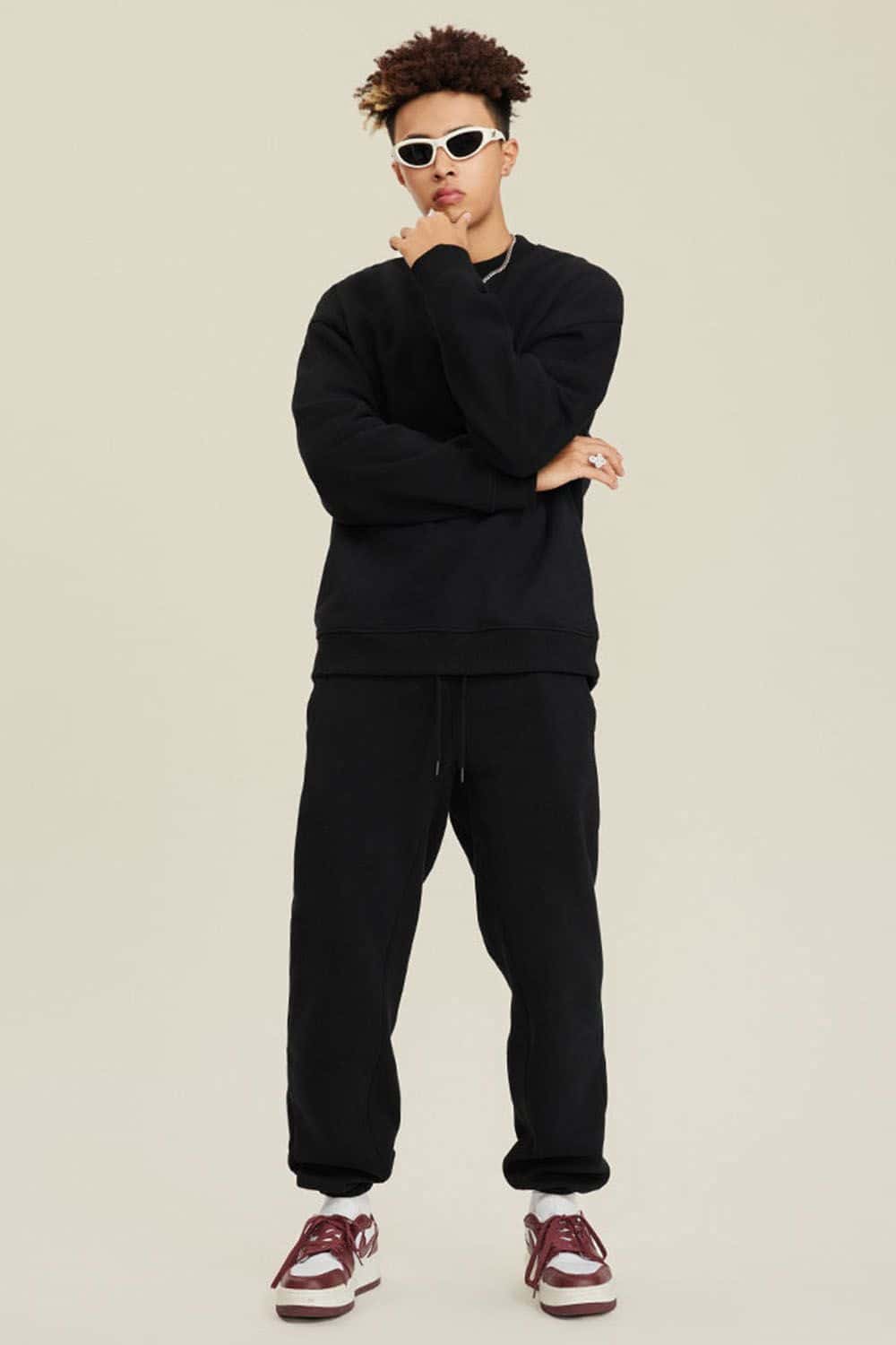 Heavyweight Brushed Fleece Relaxed Crew-Neck Sweatshirt in Black - full-length front modeled view