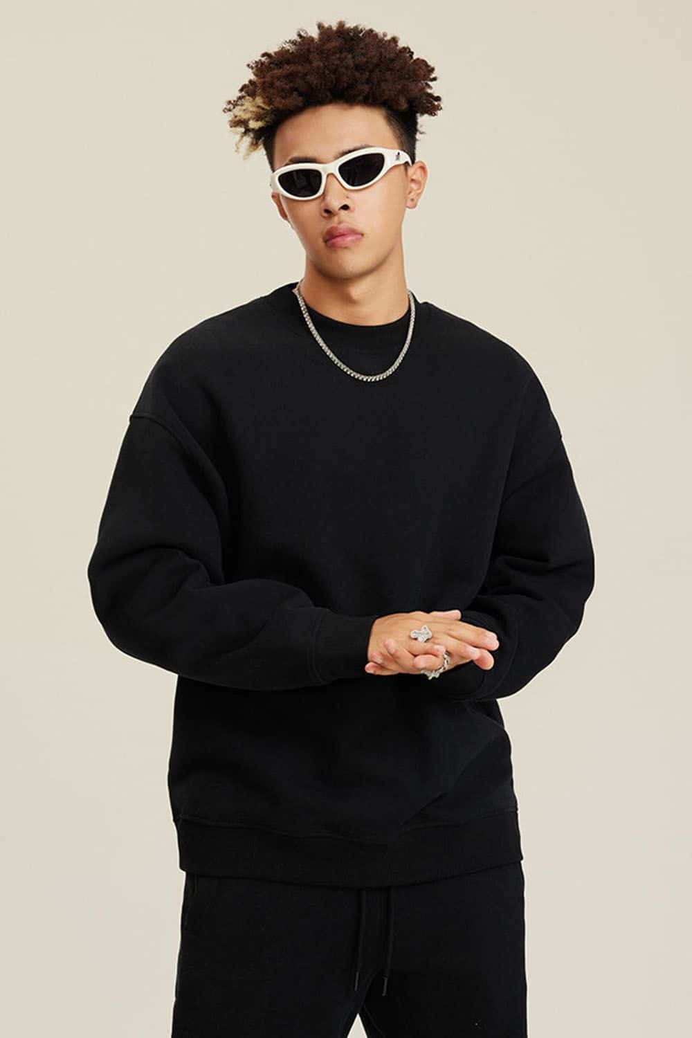Heavyweight Brushed Fleece Relaxed Crew-Neck Sweatshirt in Black - front modeled view