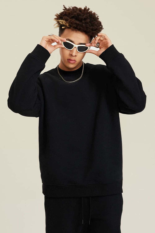 Heavyweight Brushed Fleece Relaxed Crew-Neck Sweatshirt in Black - front modeled view