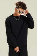 Heavyweight Brushed Fleece Relaxed Crew-Neck Sweatshirt in Black - front modeled view