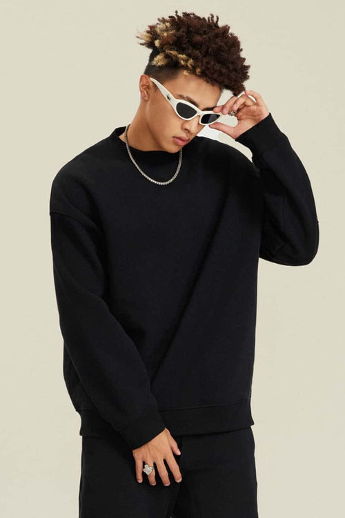 Heavyweight Brushed Fleece Relaxed Crew-Neck Sweatshirt in Black - front modeled view