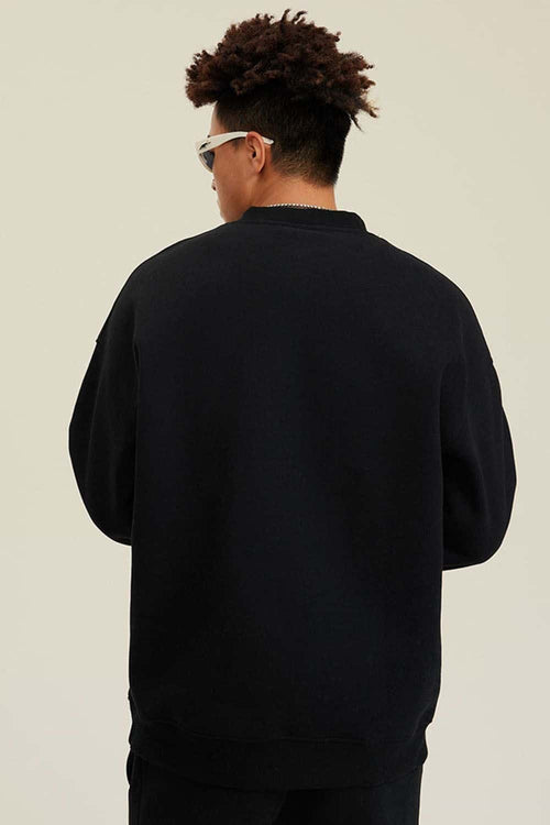 Heavyweight Brushed Fleece Relaxed Crew-Neck Sweatshirt in Black - back modeled view