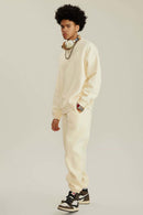 Heavyweight Brushed Fleece Relaxed Crew-Neck Sweatshirt in Cream Apricot - full-length front modeled view