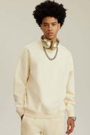 Heavyweight Brushed Fleece Relaxed Crew-Neck Sweatshirt in Cream Apricot - front modeled view