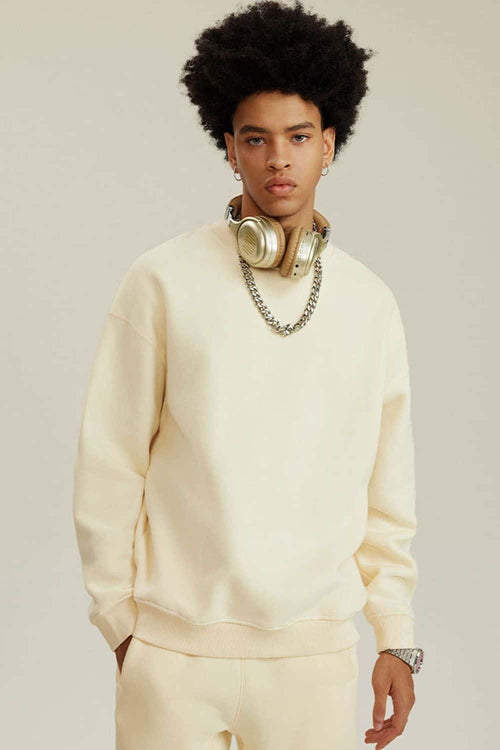 Heavyweight Brushed Fleece Relaxed Crew-Neck Sweatshirt in Cream Apricot - front modeled view