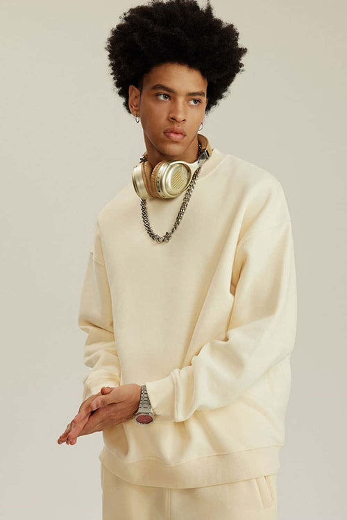 Heavyweight Brushed Fleece Relaxed Crew-Neck Sweatshirt in Cream Apricot - front modeled view