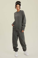 Heavyweight Brushed Fleece Relaxed Crew-Neck Sweatshirt in Gray Brown - full-length front modeled view