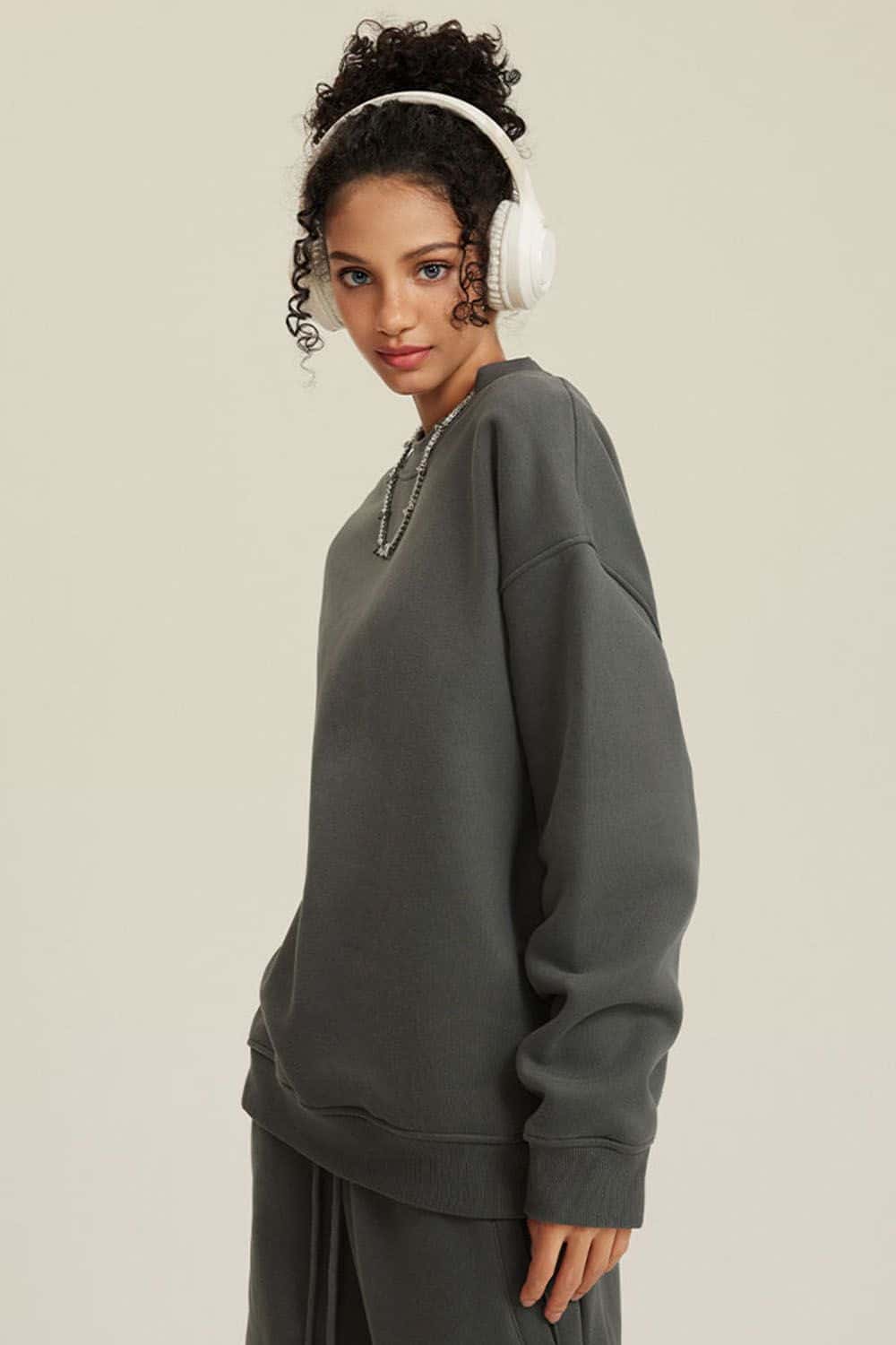 Heavyweight Brushed Fleece Relaxed Crew-Neck Sweatshirt in Gray Brown - side modeled view