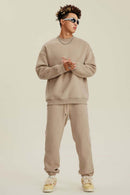Heavyweight Brushed Fleece Relaxed Crew-Neck Sweatshirt in Khaki - full-length front modeled view