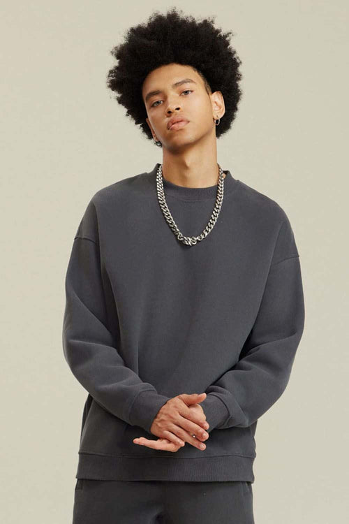 Heavyweight Brushed Fleece Relaxed Crew-Neck Sweatshirt in Medium Gray - front modeled view