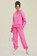 Heavyweight Brushed Fleece Relaxed Crew-Neck Sweatshirt in Rose Pink - full-length front modeled view