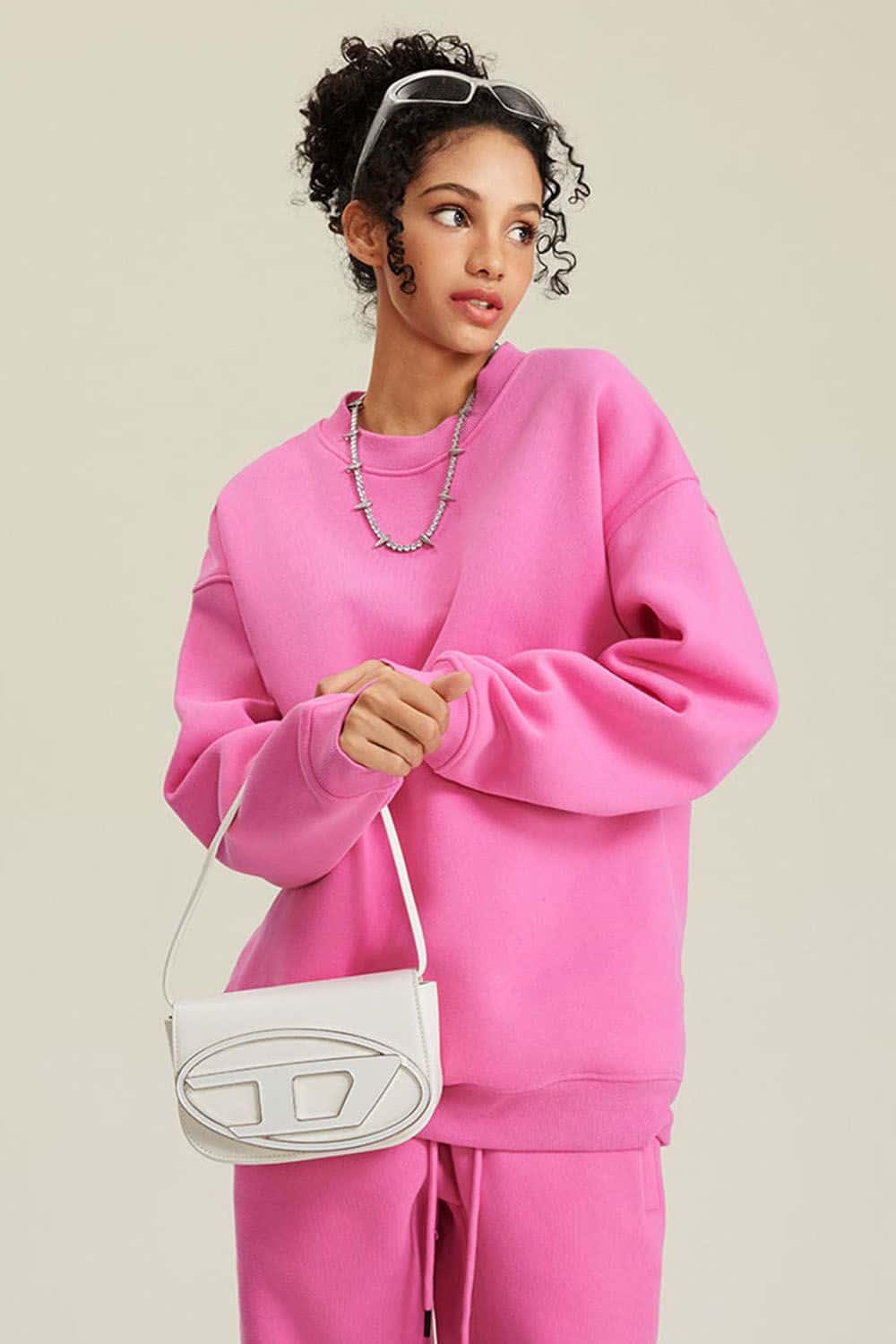Heavyweight Brushed Fleece Relaxed Crew-Neck Sweatshirt in Rose Pink - front modeled view