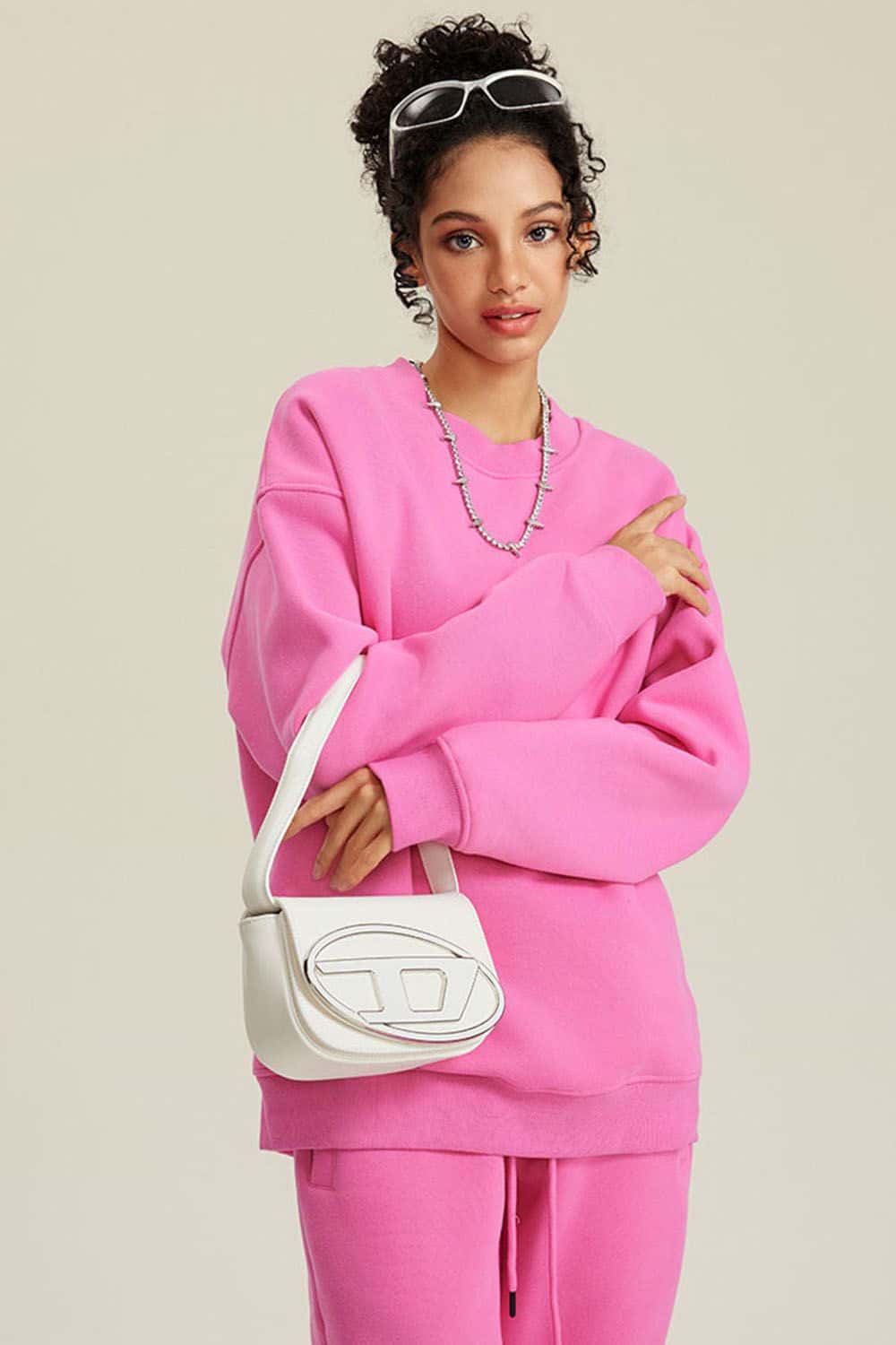 Heavyweight Brushed Fleece Relaxed Crew-Neck Sweatshirt in Rose Pink - front modeled view