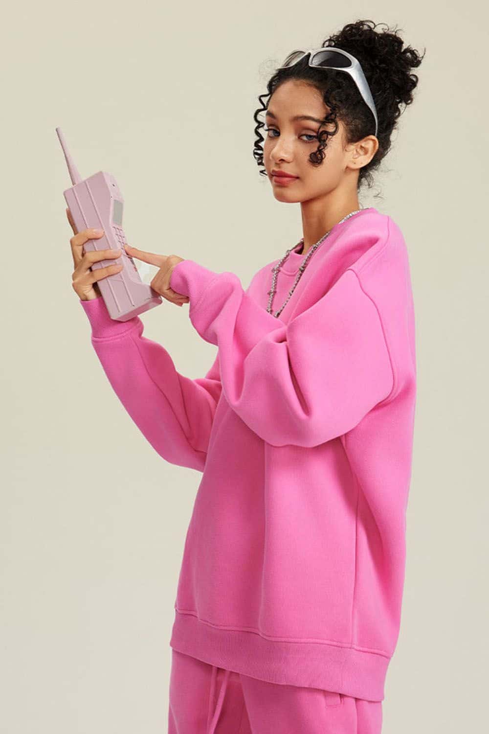 Heavyweight Brushed Fleece Relaxed Crew-Neck Sweatshirt in Rose Pink - side modeled view