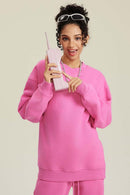 Heavyweight Brushed Fleece Relaxed Crew-Neck Sweatshirt in Rose Pink - front modeled view