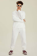 Heavyweight Brushed Fleece Relaxed Crew-Neck Sweatshirt in White - full-length front modeled view
