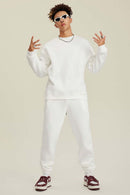 Heavyweight Brushed Fleece Relaxed Crew-Neck Sweatshirt in White - full-length front modeled view