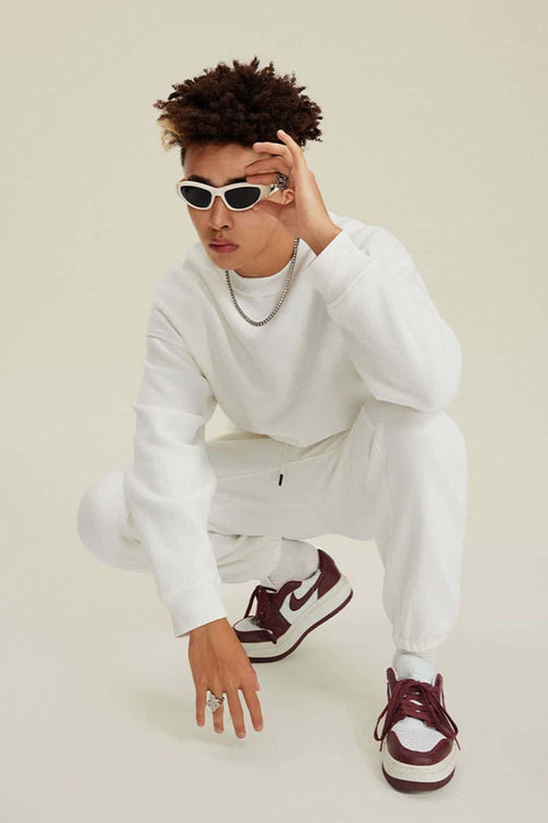 Heavyweight Brushed Fleece Relaxed Crew-Neck Sweatshirt in White - front modeled view