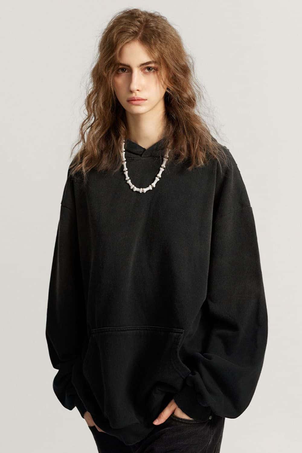 Ultra-Heavyweight Gradient-Wash Distressed Hoodie in Active Black - front modeled close-up